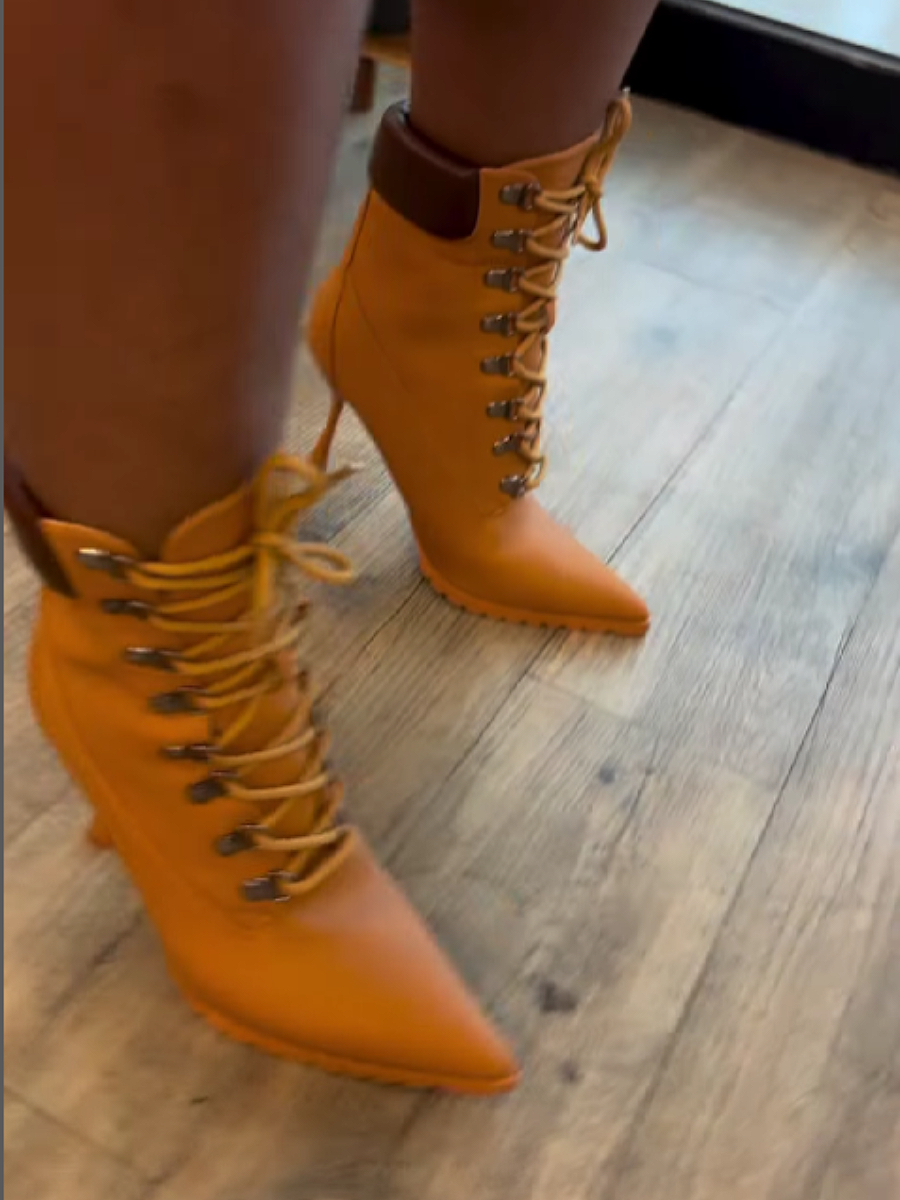 Thin-Heeled Point-Tether Boots