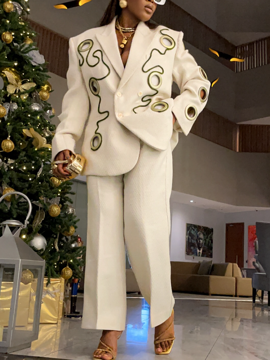 Metal Ring Decorated With Black Lines And White Suit Jacket