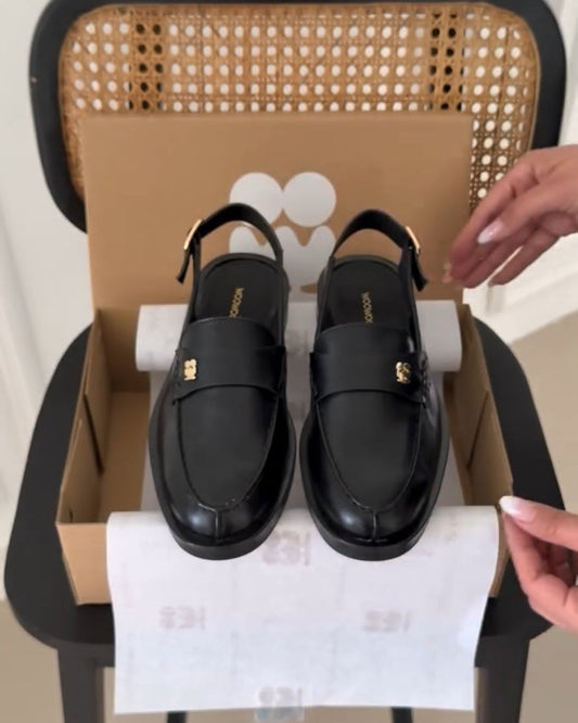 Sleek Black Leather Slip-On Loafers – Gold Buckle Strap Design