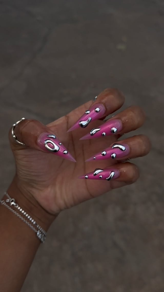 Futuristic Pink Liquid Chrome Stiletto Nails