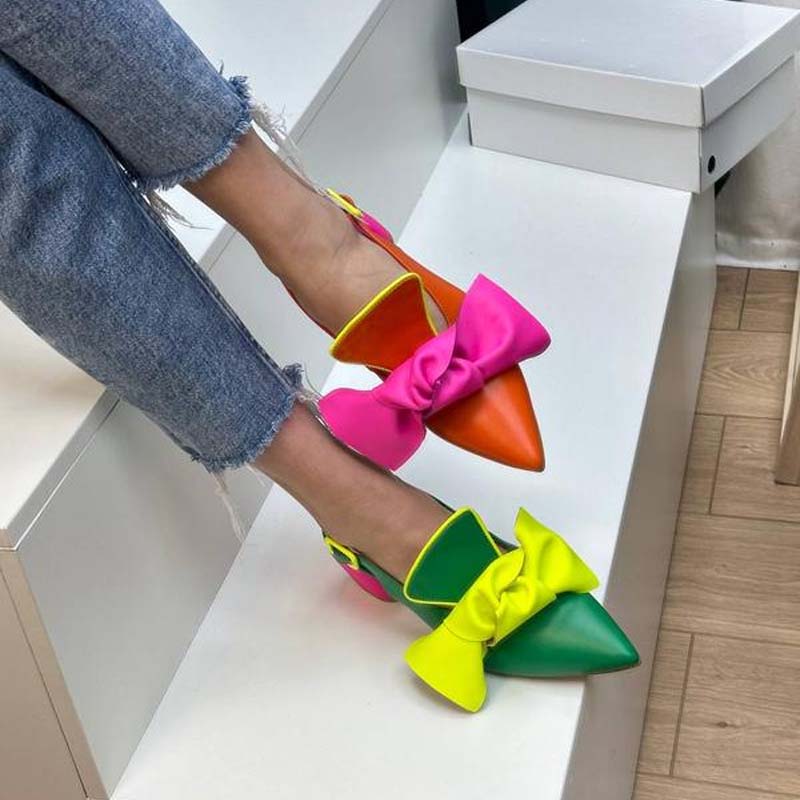 Bow-Heel Point-Heel Pumps